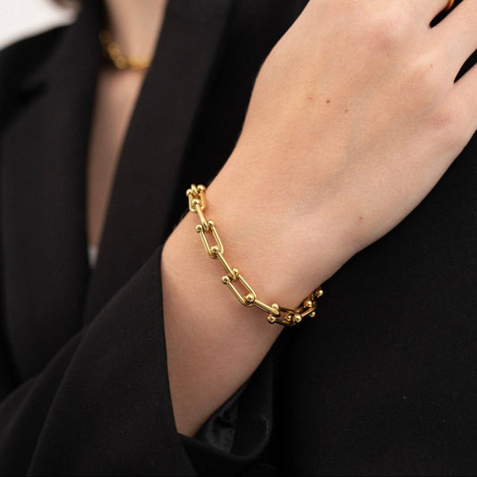 Golden link charm bracelet