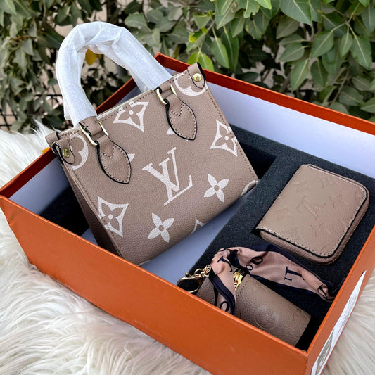 Louis Vuitton OnTheGo tote bag, with a matching wallet and other accessories