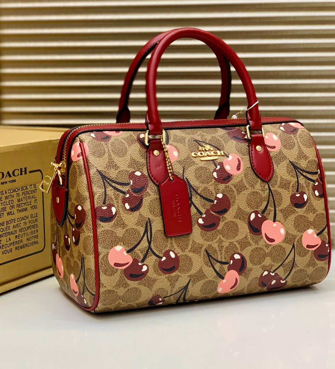 Coach Rowan Satchel bag in Signature Canvas with a cherry print