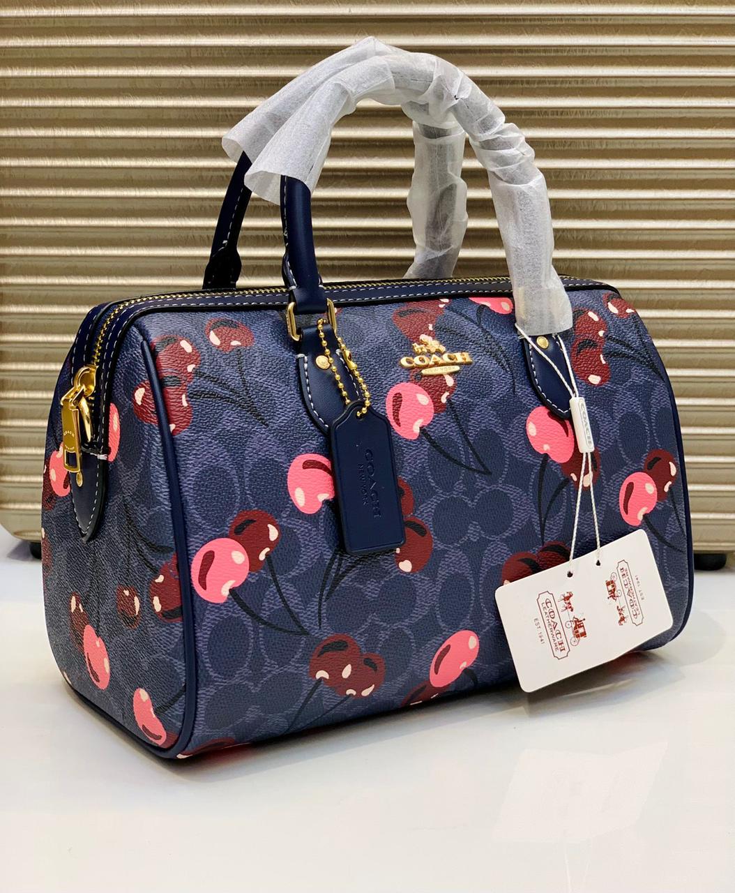 Coach Rowan Satchel bag in Signature Canvas with a cherry print